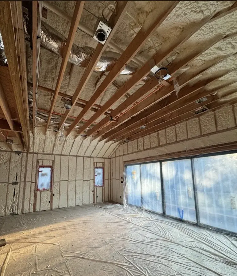 Interior walls and ceiling insulated with spray foam during new construction in Fruitland